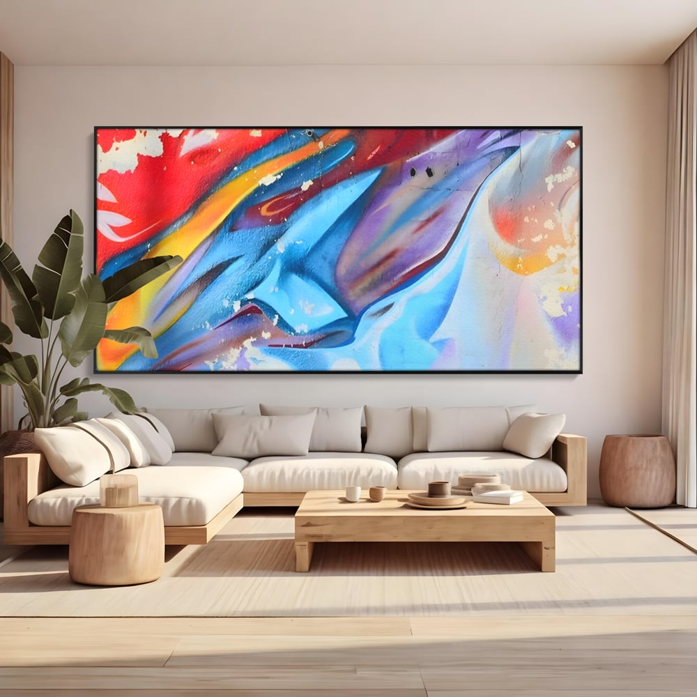 Tablou canvas cu pictura abstracta cu graffiti multicolor, in rama de aluminiu negru, pe perete intr-un living